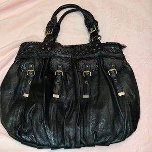 Black genuine leather Cynthia Rowley bag. The leather is so SOFT.